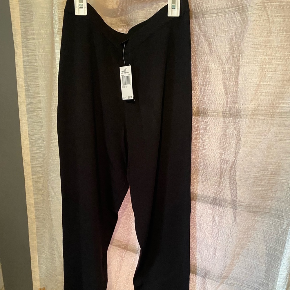 Black large knit pants grace Dane lewis